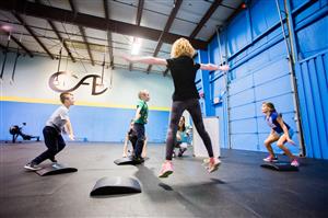 Kids jumping in crossfit class